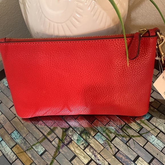 Coach Leather Wristlet
COACH - Picture 8 of 17